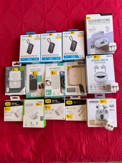 Assorted brand new unboxed unopened cell phone accessories great for gifts reasonably priced yellow price tags.