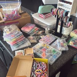 Beads to make jewelry, a resin kit and scrapbooking