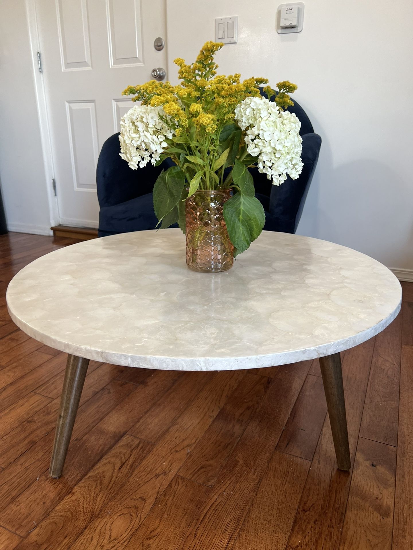 Round White Capiz Coffee Table