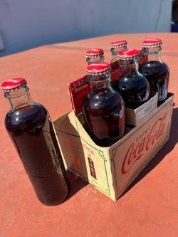 Vintage Coca Cola circa 1899 unopened bottles