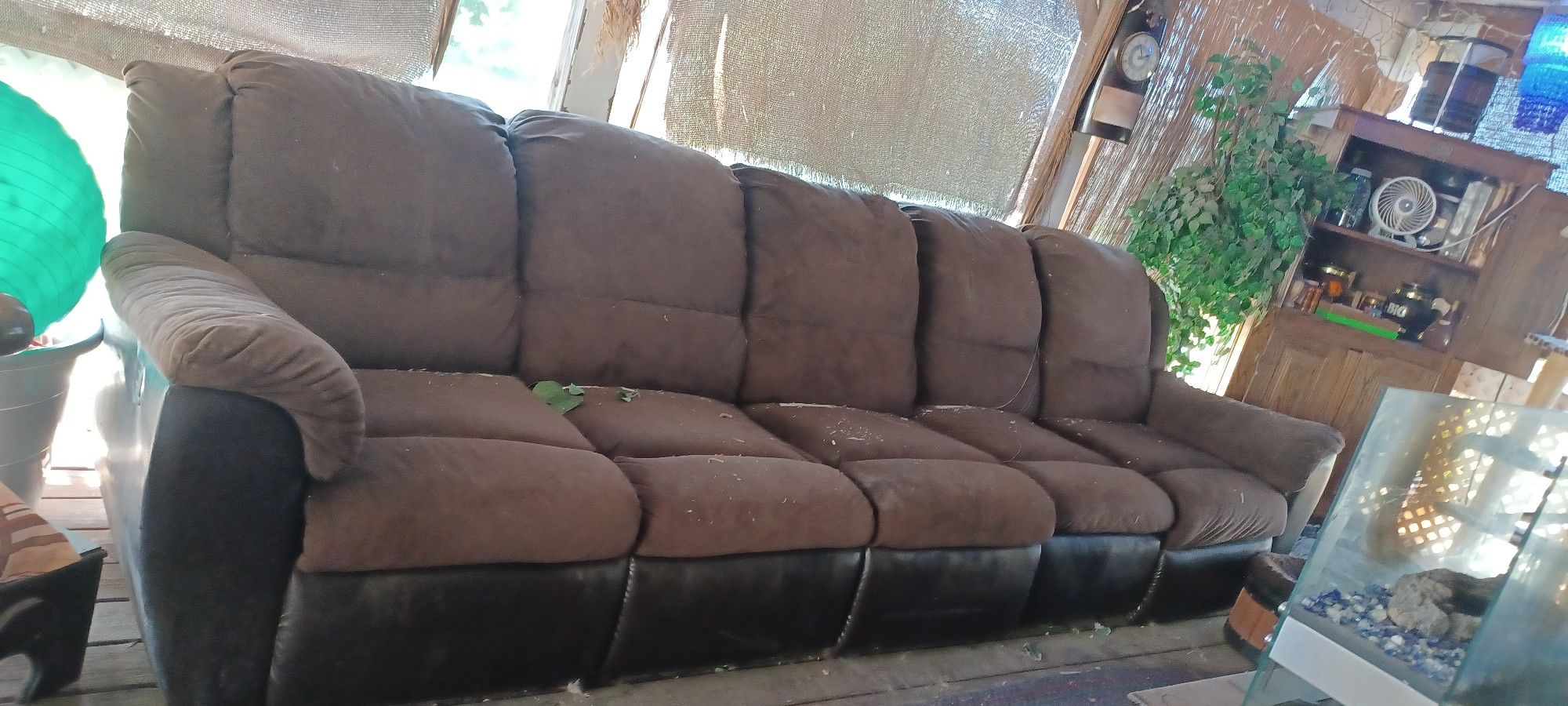 Lightly Used Sectional Sofa With Recliners and Middle Wedge Seat.