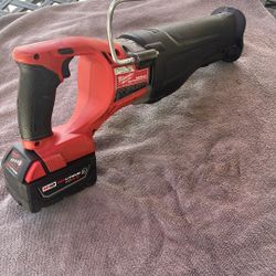 Milwaukee Fuel Saw And 5.0 Battery 