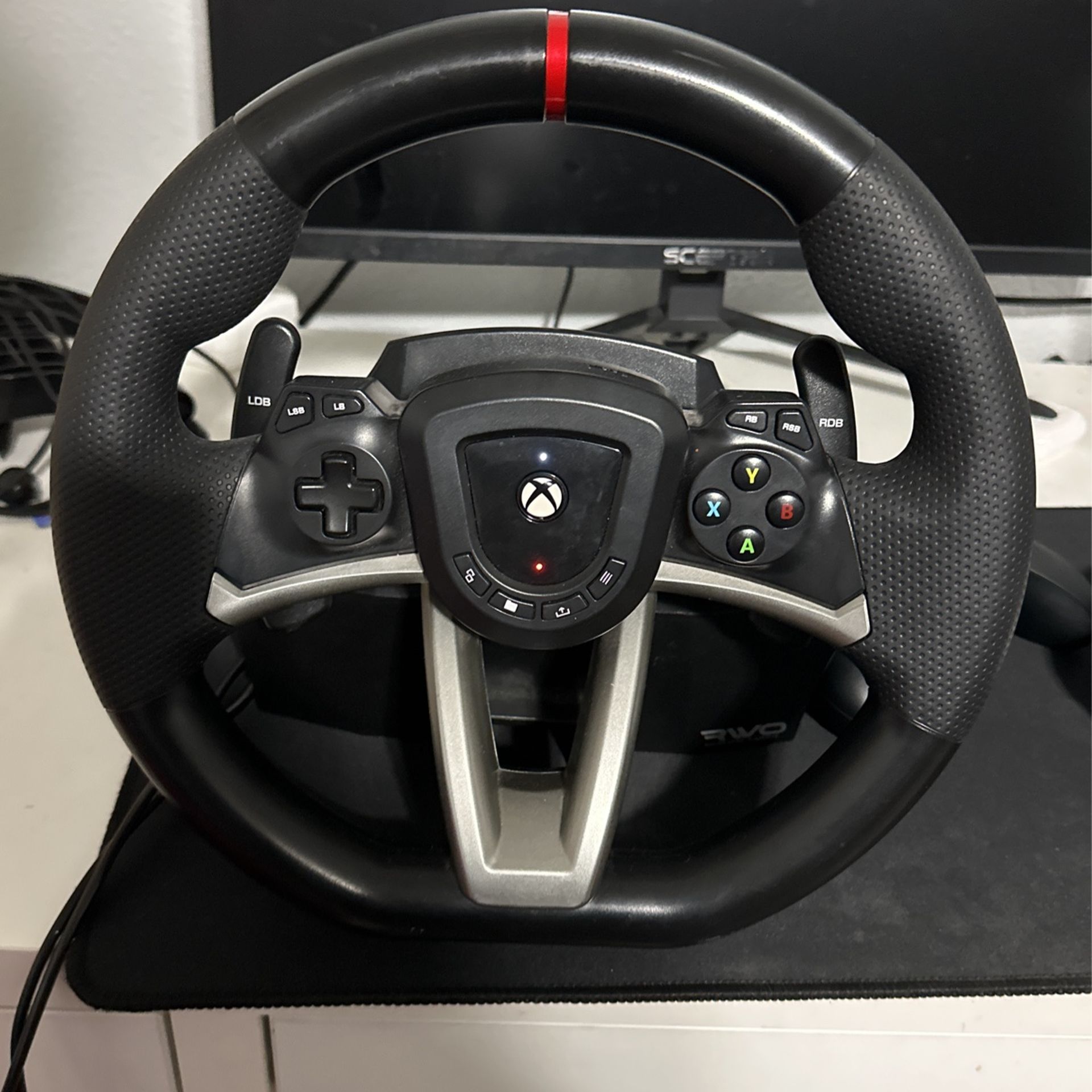 Xbox Wheel, And A Xbox Pedals.