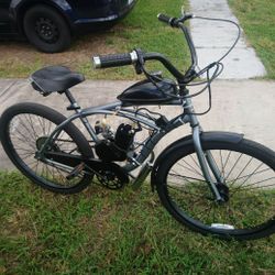 New gasoline motor for sale. Used bicycle that still looks like new.