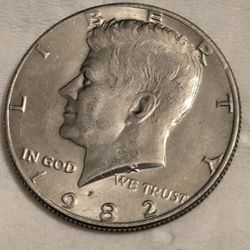 Uncirculated 1982 Kennedy Half Dollar Mint Error – Obverse DDO + Struck-Through Grease