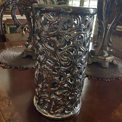 Beautiful silver cut out vase