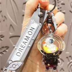 NEW! Astronaut "Dream On" Keychain w/Liquid Gold Glitter Stars & mini Astronaut floating inside,2.5"
