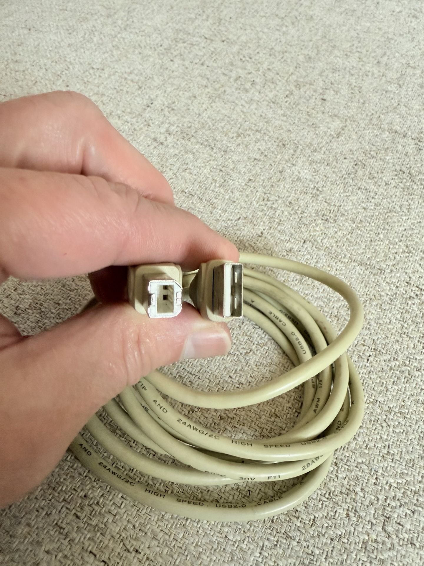 USB 2.0 A to B cable, commonly used to connect devices like printers, scanners, digital-photography devices, external hard drives and more to a comput