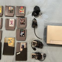 Original NES Nintendo w/ 12 Games, 2 Controllers