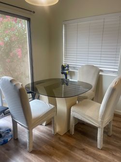 Glass dining table with chairs