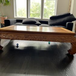Hand-Carved Balinese Solid Wood Coffee Table with Storage – $400