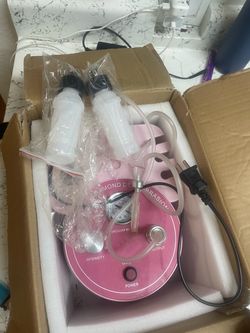 Pink microdermabrasion machine