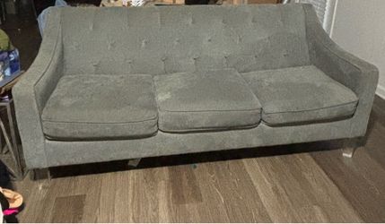 Grey tufted loveseat