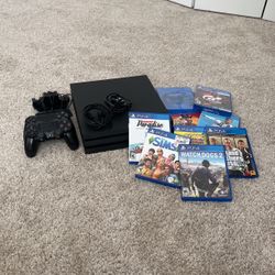 PLAYSTATION PRO, WITH REMOTES AND GAMES