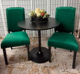 Black Table and two Green Velvet Chairs