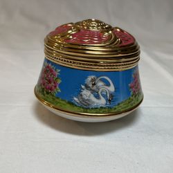 Vintage Swan Lake music jewelry/trinket box padded with black velvet lining. 3.5”W x 3”T