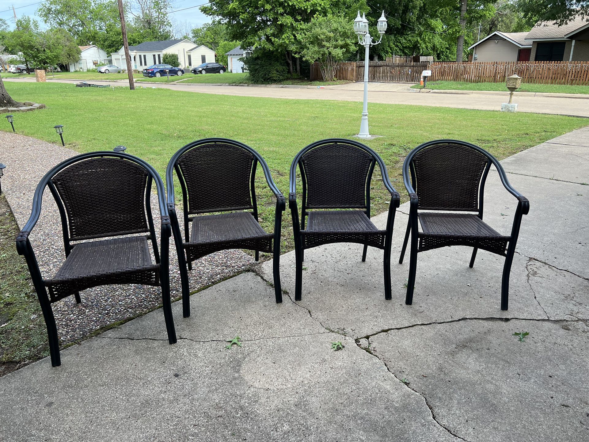 4 beautiful wicker and iron chairs