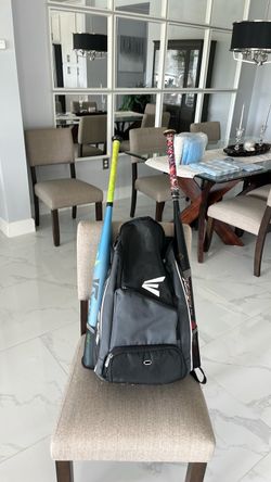 Easton Softball bag with 2 bats and glove