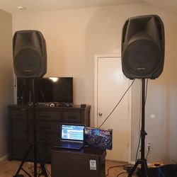 DJ Sit DJ Laptop And DJ Mixing Board Serato
