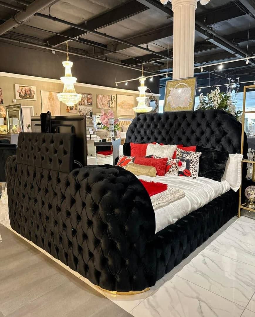 Queen size bed in black velvet, tufted, with high, padded headboard