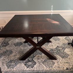 Expandable High Wooden Dining Table With 8 Chairs With Leather Seats