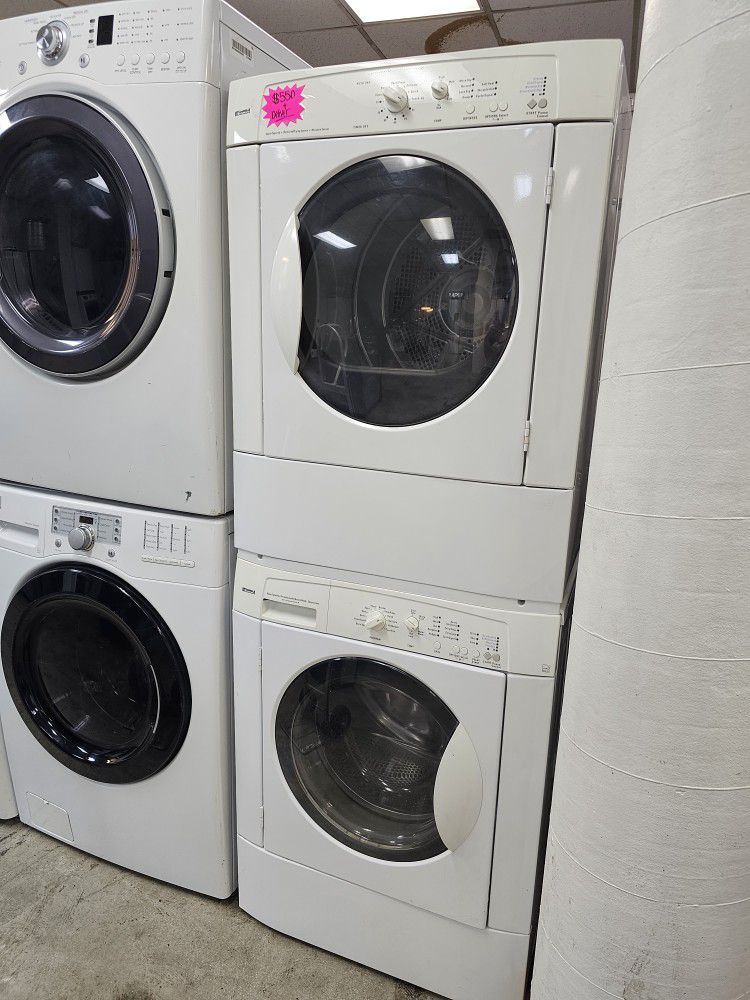 KENMORE STACKED  WHITE FRONT LOAD WASHER AND GAS DRYER SET 