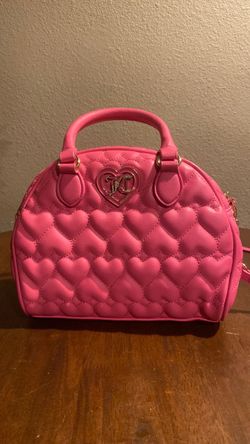 Is pink woman purse