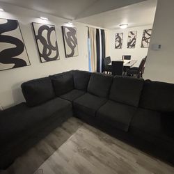 Black sectional couch 111 L chaise part is 93 and h is 35