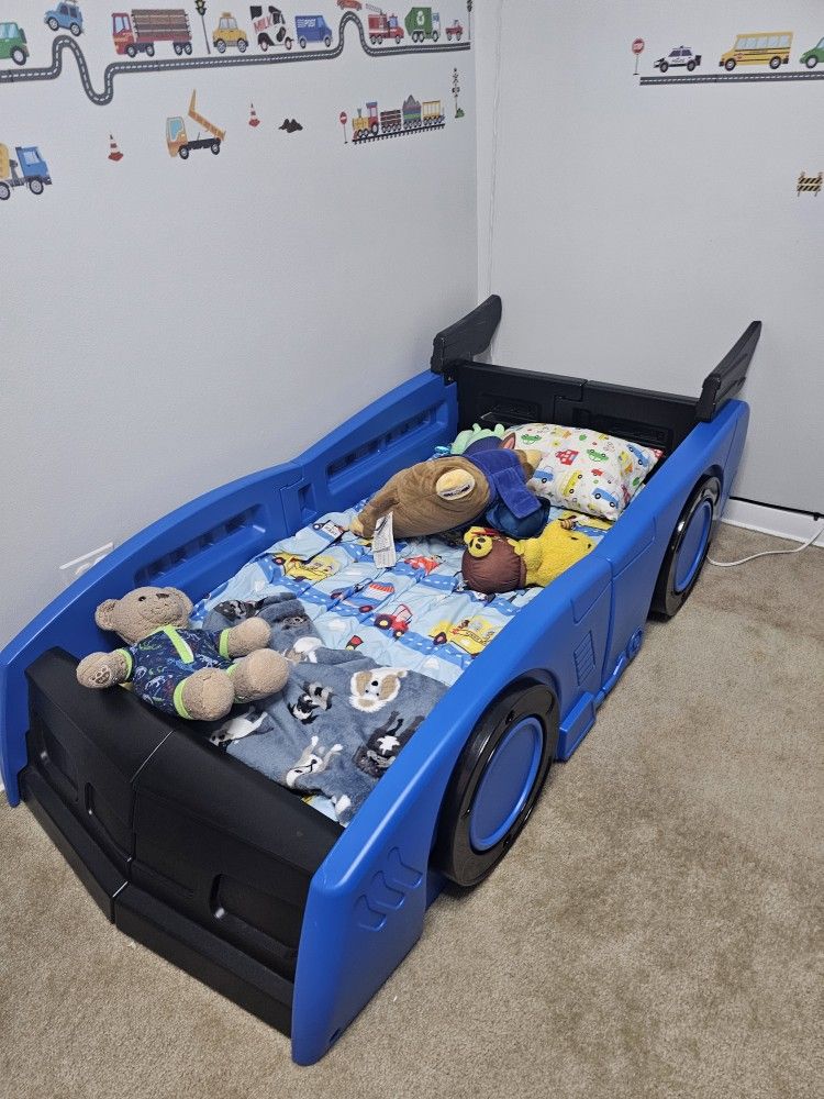 Kids car bed. Used twice.