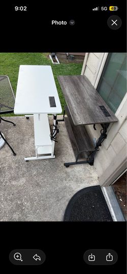 portable, height-adjustable standing desk on wheels.