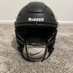 Black Riddell Speedflex Size Adult M with Sportstar Chinstrap and Nike Chinstrap Cover of wanted
