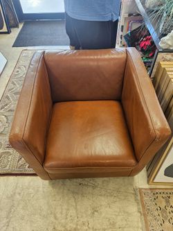 Beautiful tan leather swivel chair
