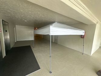 Canopy 10 by 10 feet wide the top as been replace for a thick and commercial type ajustable heights very solid frame . $125