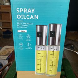 Spray oil can. Two Pens.