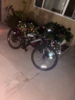 E-bike 2000w 45amp controller 26” wheels front and back head lights pushes 35:45mph