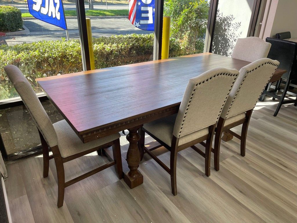 Regent Grayish Brown Dining Setby Crown Mark Table Chair