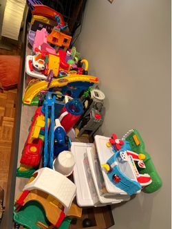 Working on pricing - lots of fisher price little people sets with people