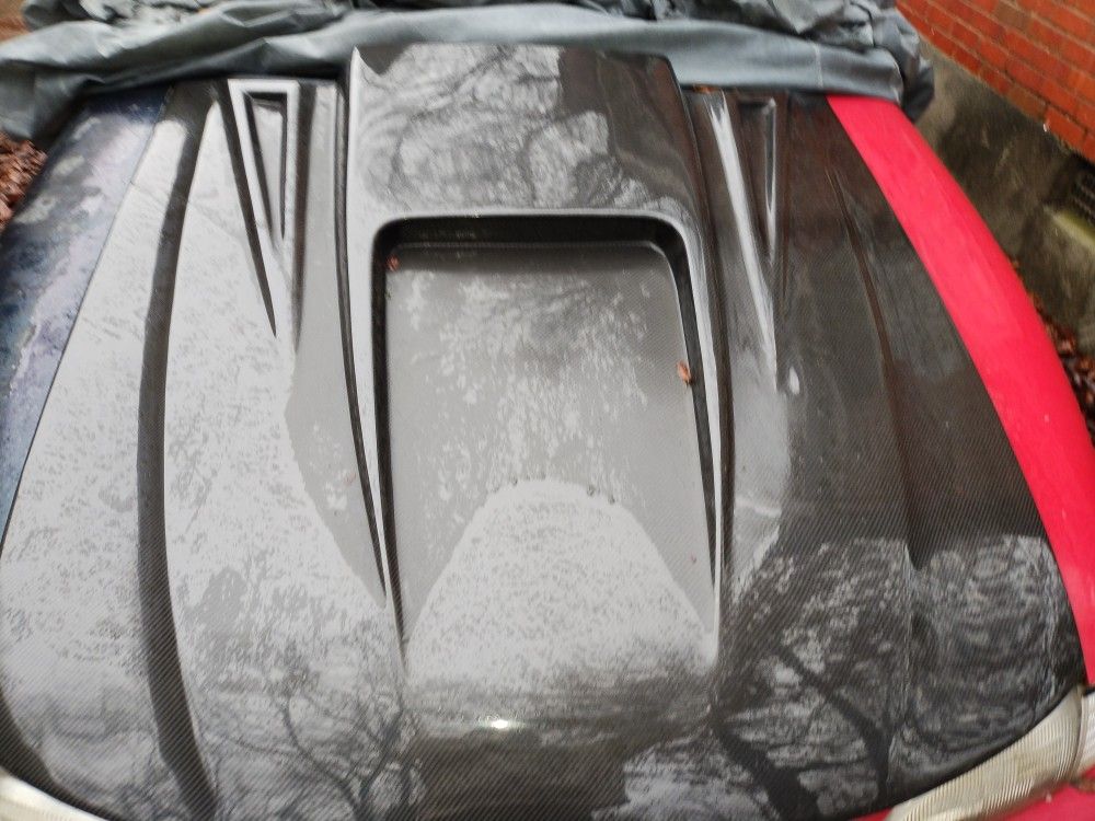 95-04 REAL CARBON FIBER MUSTANG HOOD