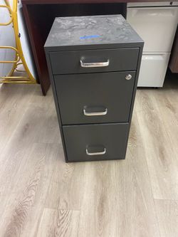 Dark gray metal file cabinet