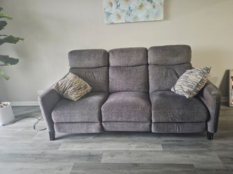 DEEP GRAY POWER RECLINING COUCH AND LOVESEAT