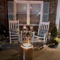 Two White Rocking Chairs