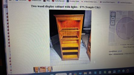 Two wood display cabinets with lights