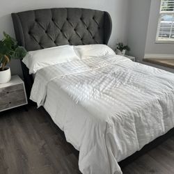 Tyne Upholstered Wingback Storage Bed