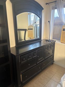 Dark color dresser with mirror