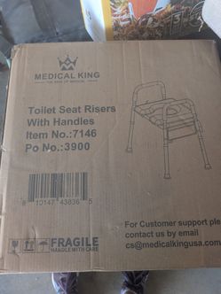 Toilet seat with riser never opened