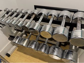 Dumbbell set w/ racks, seats, bar and mats