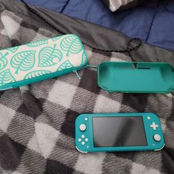 Nintendo Switch Lite With 3 Games And Memory Card