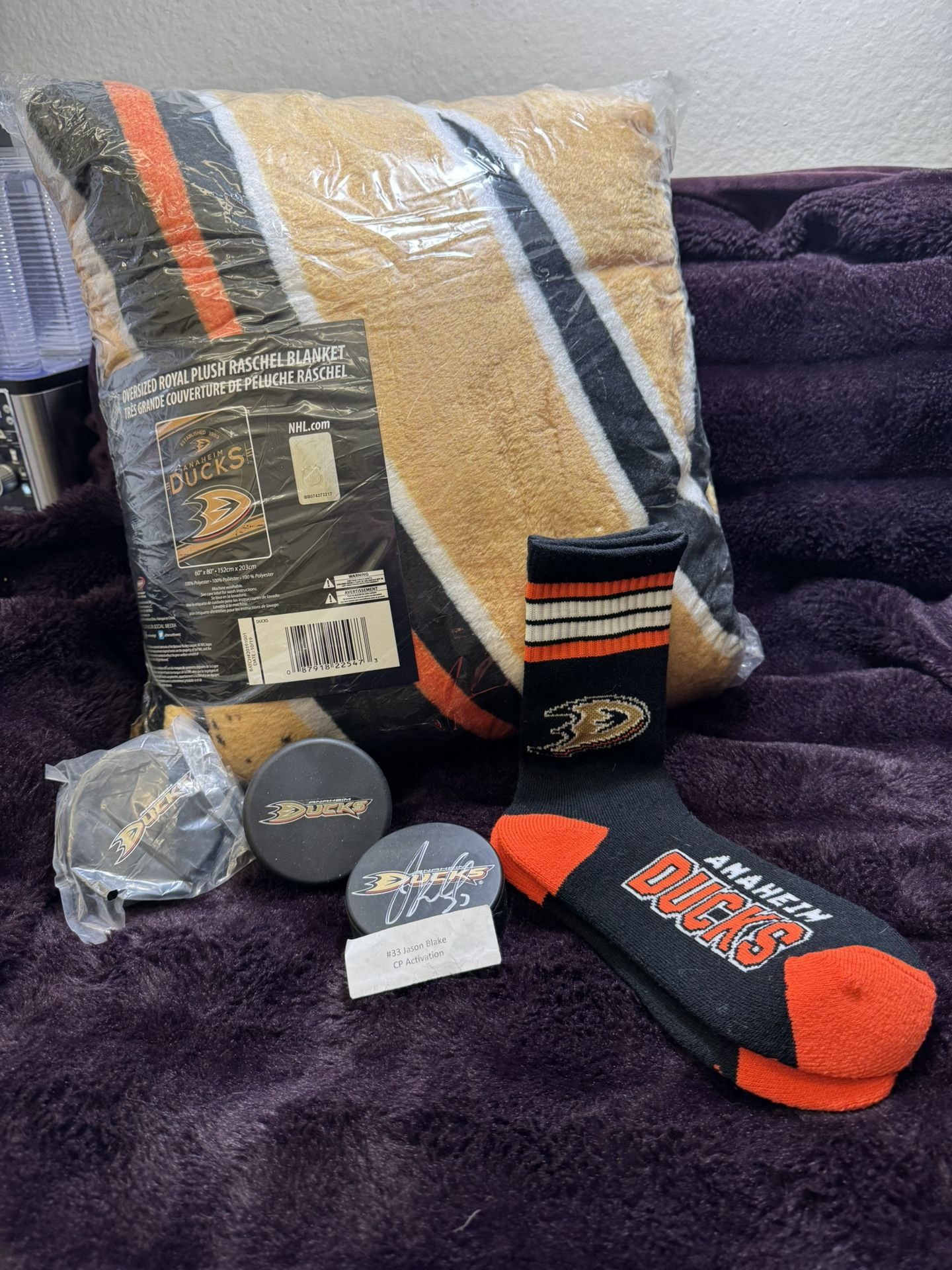Anaheim Ducks Autographed Puck And More  