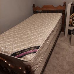 Vint.\nAge bed , twin size with mattress , top and bottom
