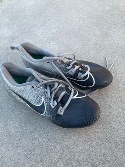 Nike grey and black football cleats size 7.5